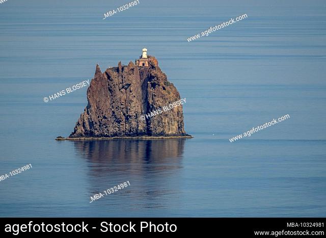 Strombolicchio, the tower-like cliff in front of the Stromboli volcano with lighthouse, Lipari, Aeolian Islands, Aeolian Islands, Tyrrhenian Sea, Southern Italy