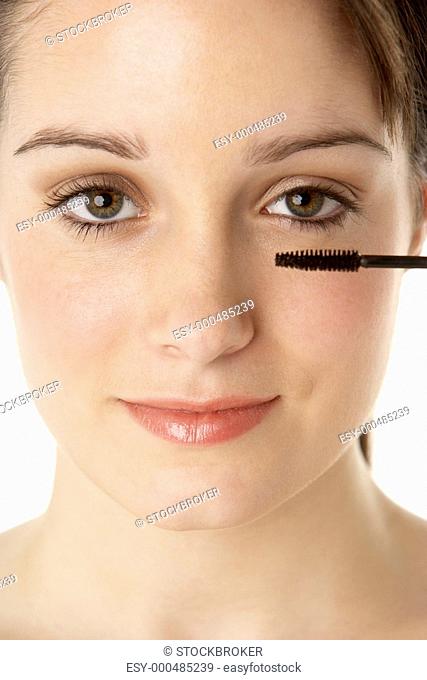Teenage Girl Applying Make Up