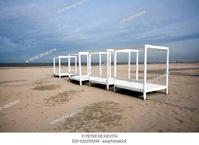 White wooden frames on the beach