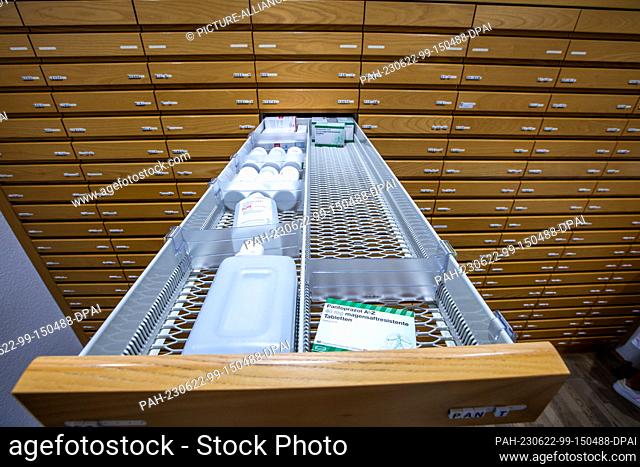 PRODUCTION - 30 May 2023, Mecklenburg-Western Pomerania, Schwerin: A half-empty drawer of prescription medicines for stomach ailments in a pharmacy cabinet at...