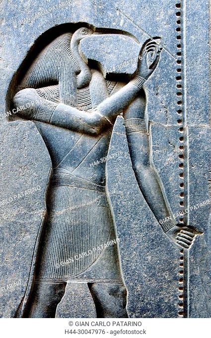 Luxor, Egypt. Temple of Luxor (Ipet resyt): the god Toth carved on a statue of the king Ramses II (1303-1212 b.C.)