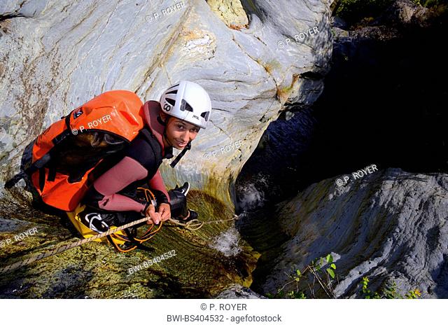 young woman canyoning , France, Corsica, Bastia