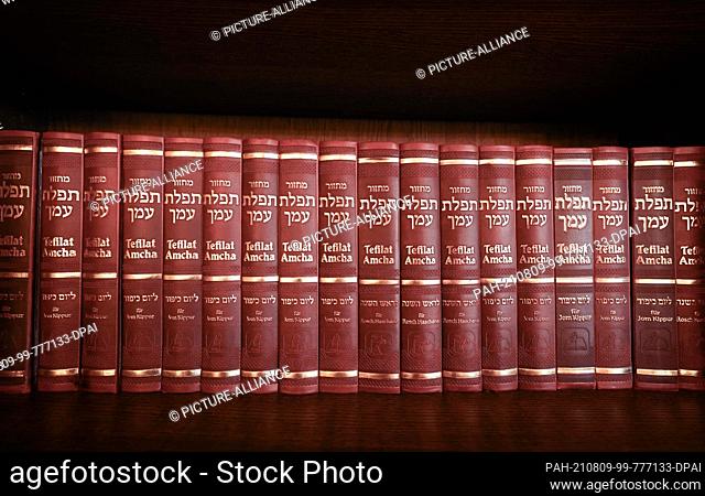 09 August 2021, Schleswig-Holstein, Lübeck: Prayer books in German are on a shelf in the Carlebach Synagogue. After about six years of renovation