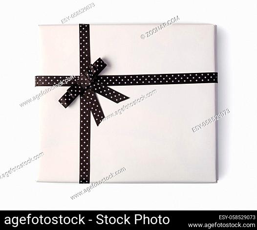 white present paper boxes with ribbon bow, isolated on white