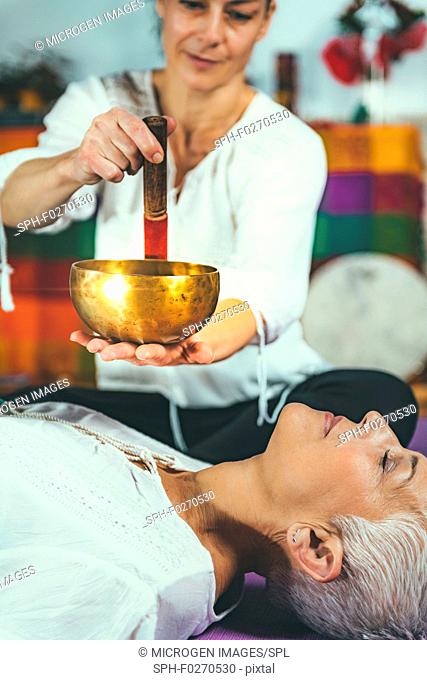 Tibetan singing bowl in sound meditation therapy