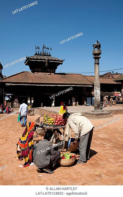 Bhaktapur is a busy city on a trading route through the mountains of Nepal. There are large holy sites, and street vendors offer the visitor food and fresh...