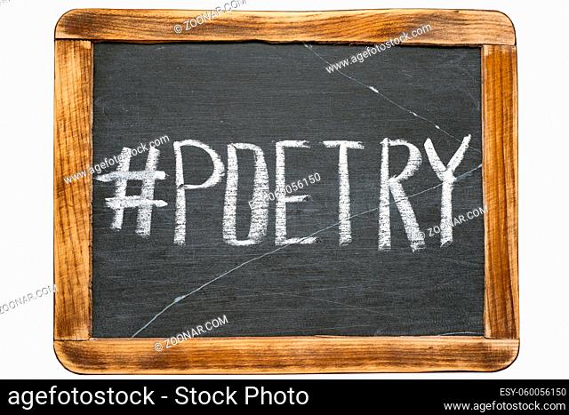 poetry hashtag handwritten on vintage school slate board isolated on white