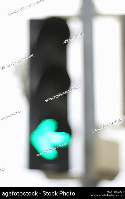 traffic light system with green light sign, abstract blur