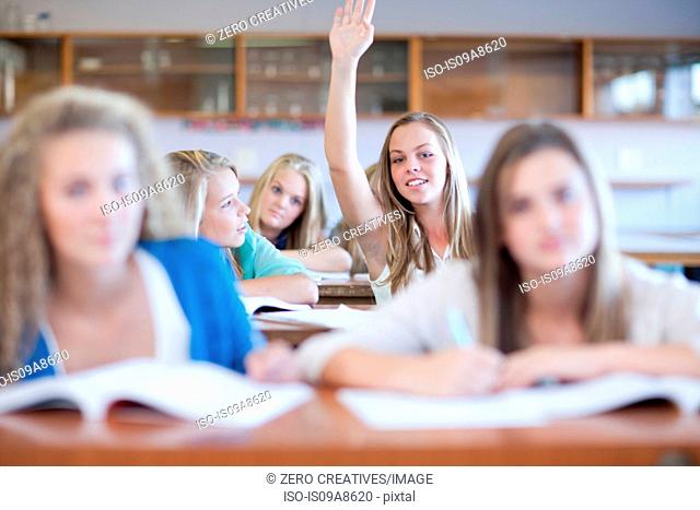 School girls enjoying science lesson