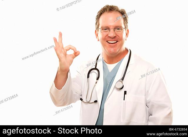 Male doctor giving the okay sign with his hand isolated on a white background