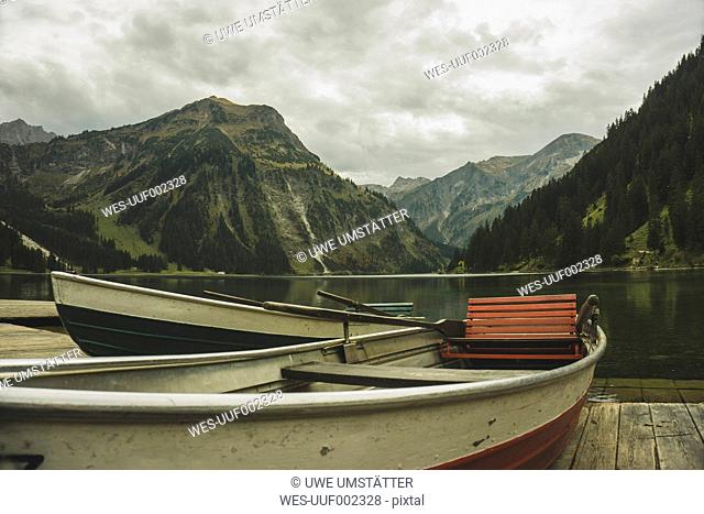 Austria, Tyrol, Tannheimer Tal, boats at mountain lake