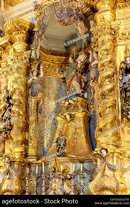 Gold-plated baroque altar in old and historic church in Pelourinho district, city of Salvador, Bahia