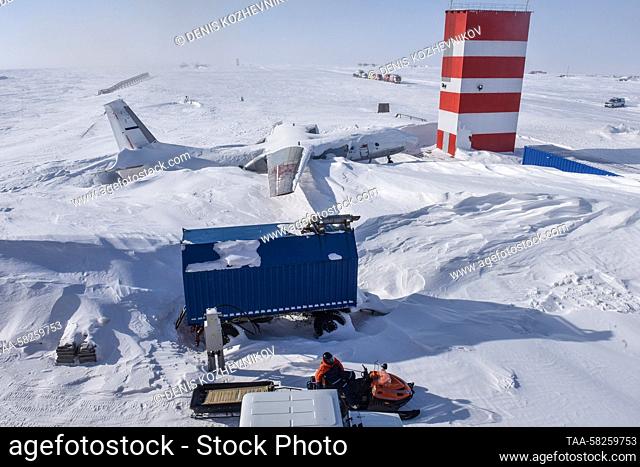 RUSSIA, KRASNOYARSK REGION - APRIL 6, 2023: A rescuer rides a snowmobile at an airport in Norilsk during the Safe Arctic exercise held by the Russian Emergency...