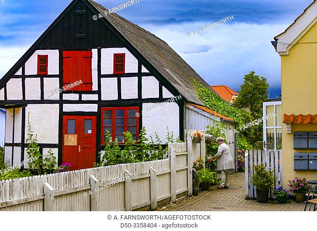 Sæby, Denmark Side streets of the village with cute houses and potted plants