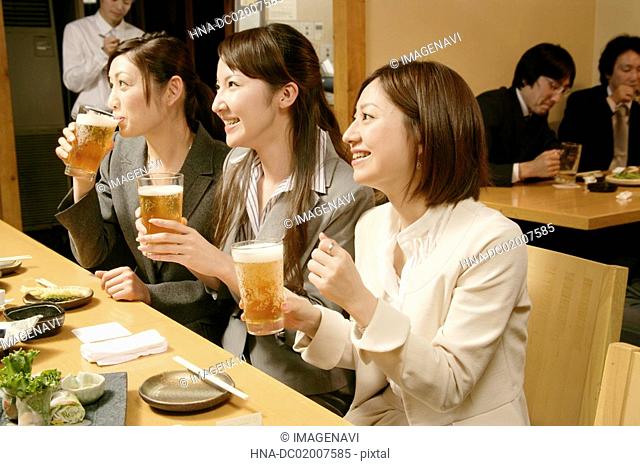 Women chattin in the Japanese-style pub