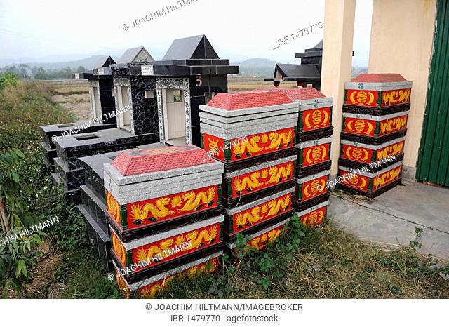 Stacked coffins at a cemetery near Hanoi, North Vietnam, Vietnam, Southeast Asia, Asia