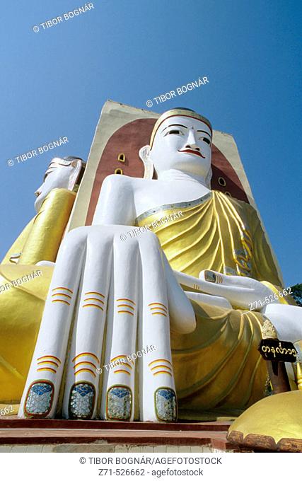 Buddhas at Kyaikpun Paya, Bago. Myanmar