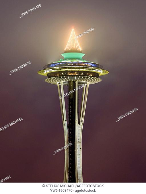 Space Needle lighting low cloud at night, Seattle, Washington, USA
