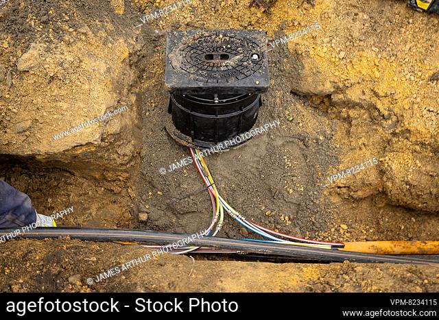 Illustration picture shows the installation of optical fiber in a residential area in Ghent, Tuesday 08 February 2022. Proximus called on the government to...
