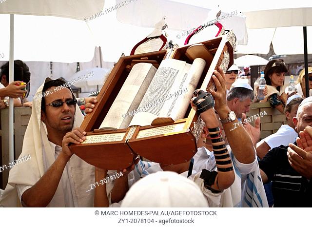 Jewish Child showing the Torah scroll Bar Mitzvah in Western Wall Jerusalem