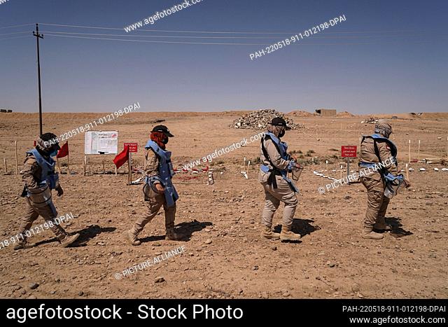 18 May 2022, Iraq, Tal al-Reem: Female members of the Swiss Foundation for Mine Action (FSD) take part in a mine clearance operation to locate and clear...