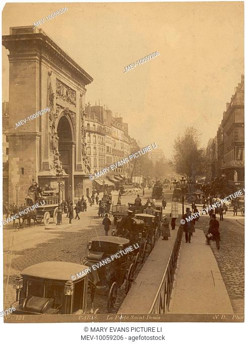 A street scene in front of the Porte Saint Denis - one of the original gates into the city