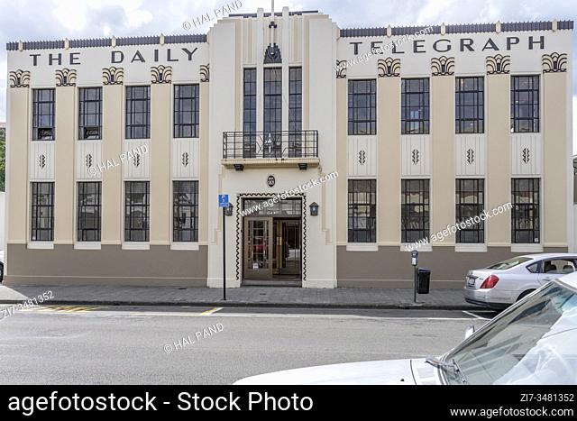 NAPIER, NEW ZEALAND - November 11 2019: cityscape with decorated 30's picturesque historical Deco ""The Daily Telegraph"" commercial building on central street
