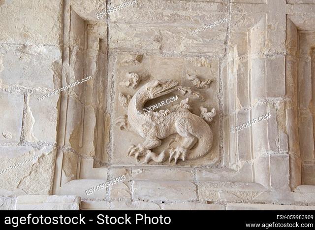 low relief of a salamander, the symbol of Francois I, in the chateau of Chambord