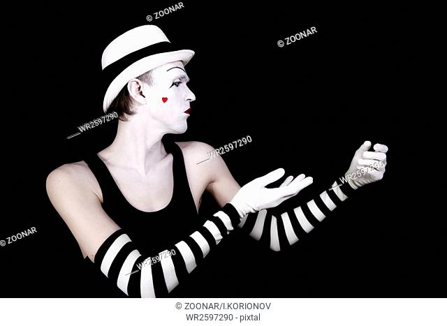 dancing mime in white hat