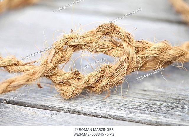 Germany, Reef knot of hemp rope, close up