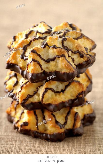 Three stacked coconut and chocolate Rochers
