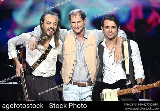 18 October 2023, Saxony, Leipzig: The Austrian rock band Wanda with bassist Reinhold ""Ray"" Weber (from left), singer Michael Marco Fitzthum and guitarist...
