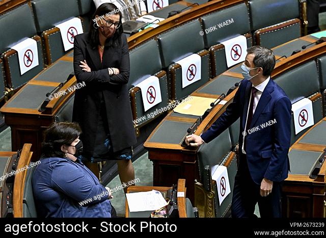 Open Vld's Maggie De Block (L) and Prime Minister Alexander De Croo (R) pictured before the start of a plenary session of the Chamber at the Federal Parliament...
