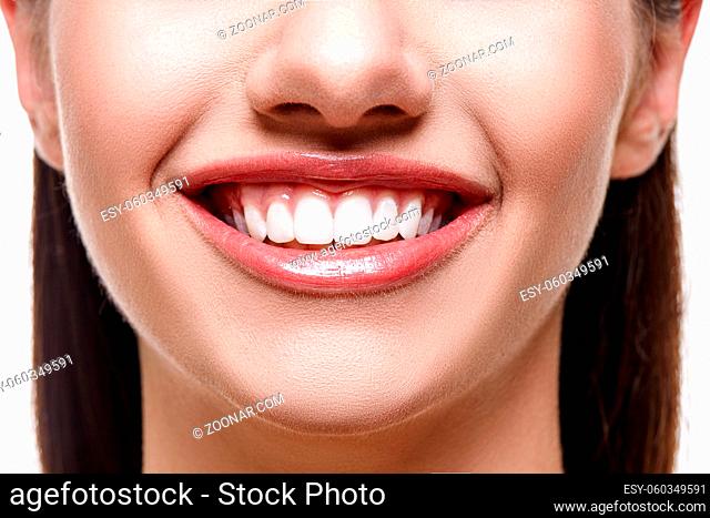 closeup of smiling woman with healthy white teeth