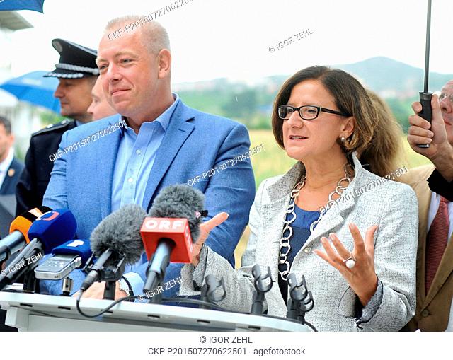 Austrian and Czech interior ministers Johanna Mikl-Leitner (right) and Milan Chovanec speak during a press conference after their talks about police cooperation