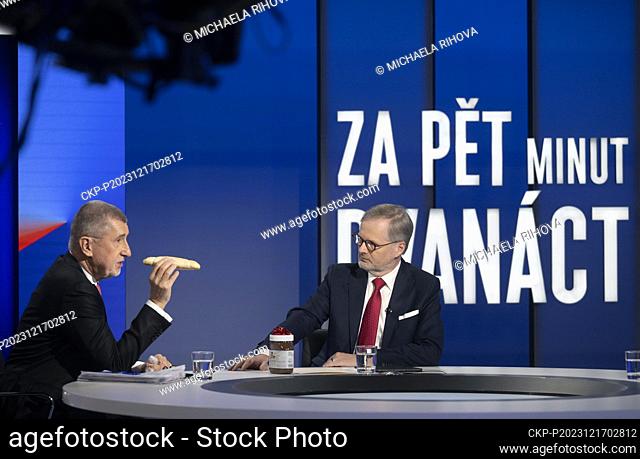 Czech Prime Minister Petr Fiala (ODS), right, and former PM Andrej Babis (ANO) attend a discussion programme on Nova TV, Five Minutes to Twelve, Prague