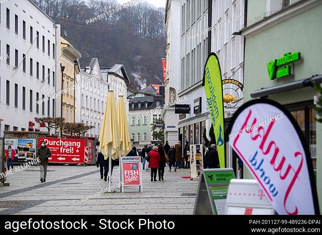 27 November 2020, Bavaria, Passau: People walk through the city centre of Passau. Passau imposes strict exit restrictions in view of the sharp rise in the...