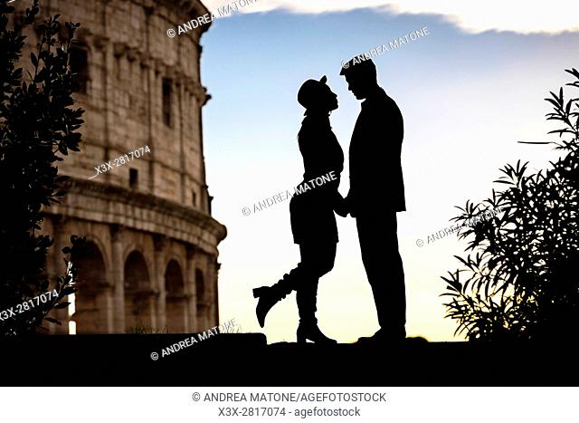 Couple silhouette. Roman Colosseum. Rome, Italy