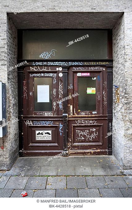 Graffiti on wooden door, Haidhausen, Munich, Bavaria, Germany