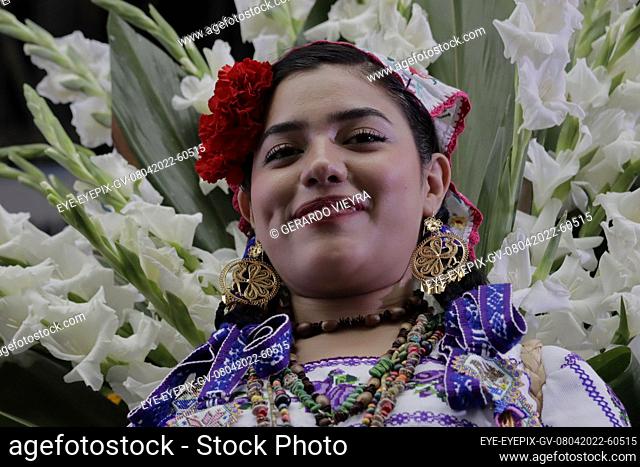 MEXICO CITY, MEXICO - APRIL 8, 2022: A woman takes part in the contest and festivities of The Most Beautiful Flower of the Ejido with The objective to make...