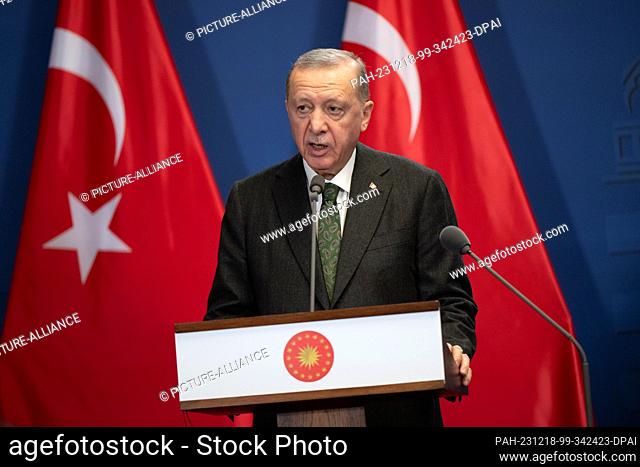 18 December 2023, Hungary, Budapest: Recep Tayyip Erdogan, President of Turkey, speaks at the Carmelite Monastery during a joint statement with Hungarian Prime...