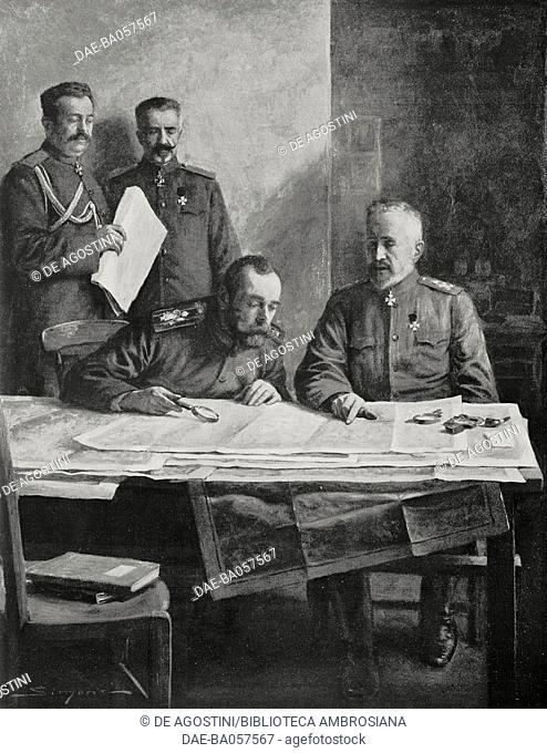 Nicholas II (1868-1918), Tsar of Russia, left, at a table with Nicholas Nikolaevich Romanov (1856-1929), Russian Grand Duke and officer, right, checks maps