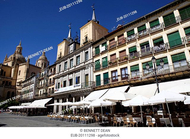 Cafes in the Plaza Mayor with the Cathedral to the left