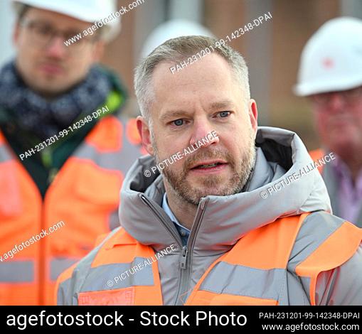 30 November 2023, Brandenburg, Cottbus: Marc Hermann, Overall Project Manager New Cottbus Plant Deutsche Bahn AG, pictured during a press trip to the new ICE...