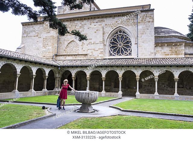 Woman in a cloister. San Pedro de la Rua church. Estella. Navarre, Spain, Europe