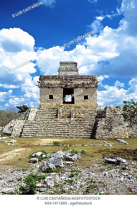 Temple of the Dolls Templo de las Siete Muñecas is an imposing looking building on a pyramidal base with a short tower atop its roof  A monolithic stela stands...