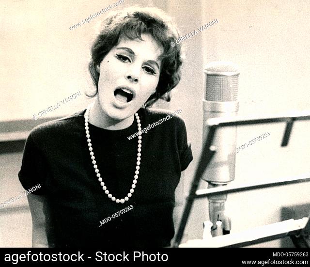 Italian singer and actress Ornella Vanoni in a recording studio. Italy, 1960s