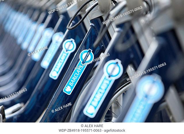 A view of a row of Barclays Cycle hire scheme bikes at their docking station