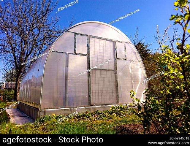 Modern Polycarbonate Greenhouse in Allotments for Growing Vegetables, Glasshouse Made of Polycarbonate, Farmland with Glasshouse, Plant Nursery