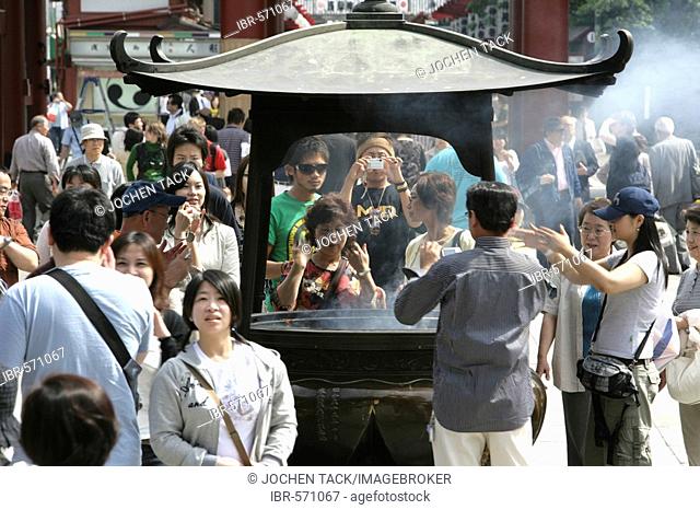 Japan, Tokyo: Shrine festival, called Matsuri. Asakusa Kannon Shrine Temple district. incense fountain